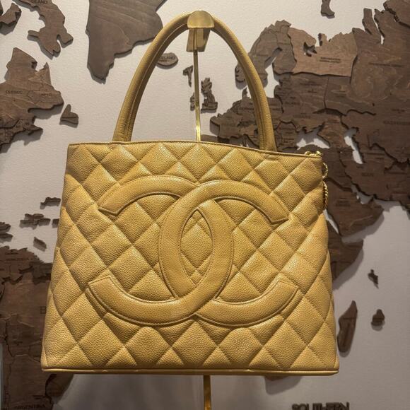 CHANEL Handbags - Chanel Vintage Caviar Beige Gold Medallion Tote Authentic CoA